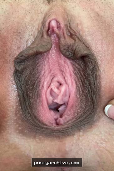 Extreme closeup open amateur pussy — Detailed close-up of a pink open pussy, every fold and texture visible.